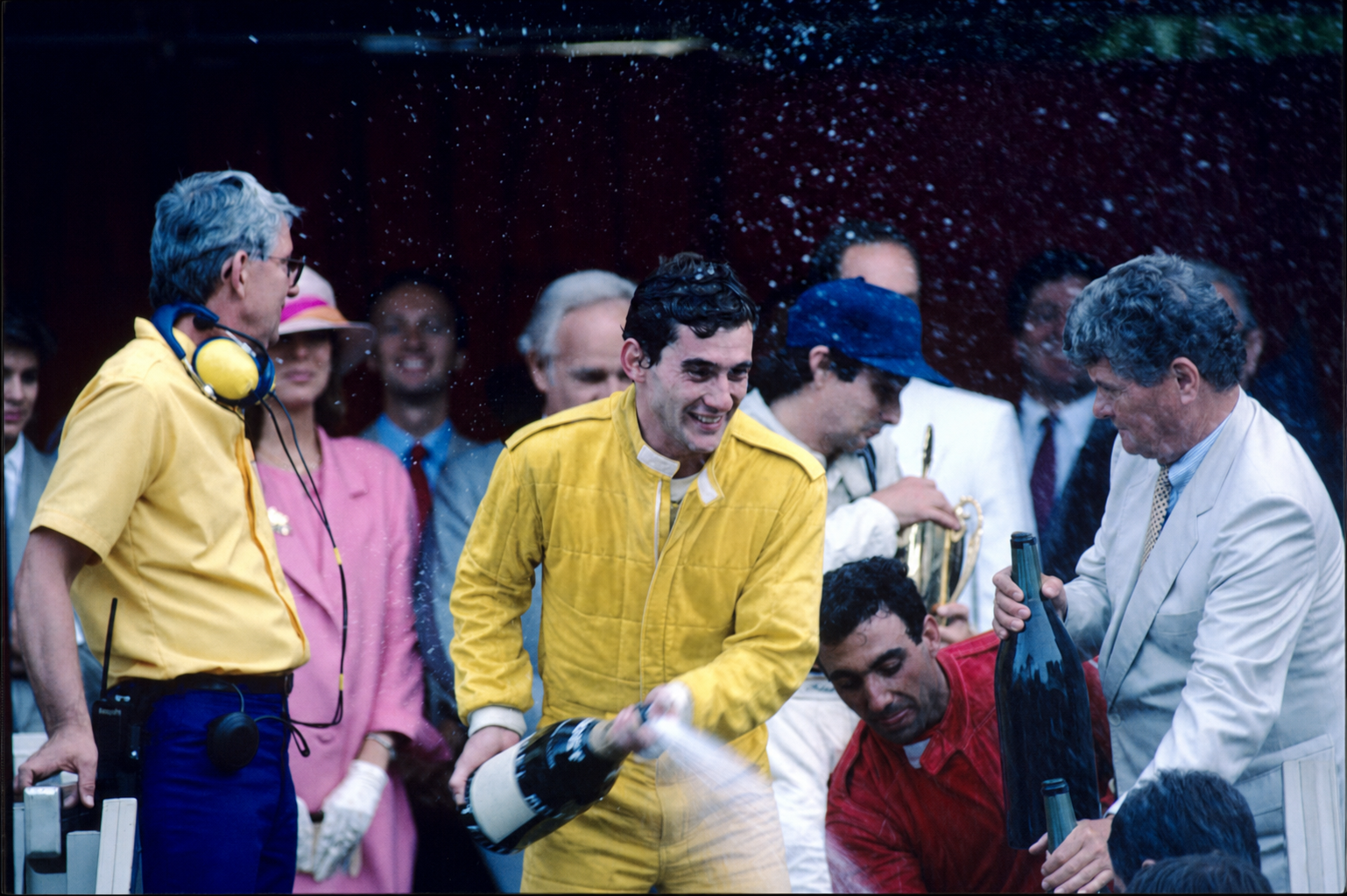 Ayrton Senna celebrating at the Monaco Grand Prix